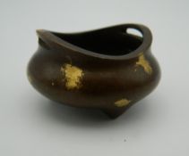 A Chinese miniature gold splash bronze censer. 4.5 cm wide.