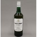 A single bottle of Black & White 70% Proof Whisky