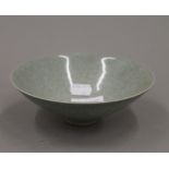 A Chinese celadon ground crackle glaze bowl. 15.5 cm diameter.