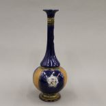 A Doulton Lambeth porcelain vase.