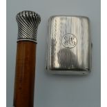 A silver topped walking stick and a silver cigarette case. The walking stick 89 cm long.