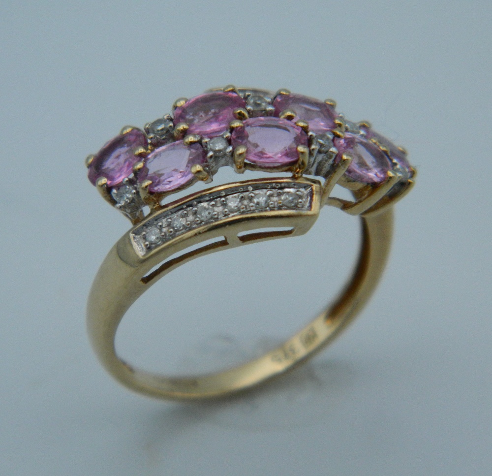 A 9 ct gold diamond and pink sapphire ring. - Image 2 of 4