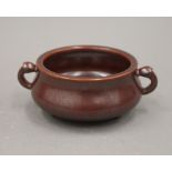 A Chinese red porcelain censer. 13 cm wide.