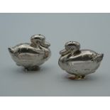 A pair of duck formed salt and pepper. 5 cm wide.