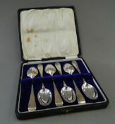A boxed set of silver rat tail teaspoons, makers mark of George Jackson & David Fullerton,