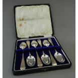 A boxed set of silver rat tail teaspoons, makers mark of George Jackson & David Fullerton,