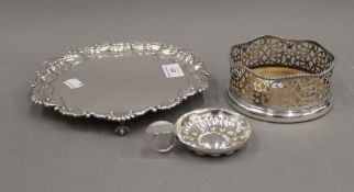 A small E.P.N.S salver, a plated wine tester and plated W.M.F silver plated and wood bottle coaster.