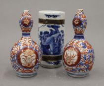 A pair of 19th century Japanese porcelain double gourd shaped Imari vases and a Chinese blue and