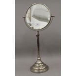 A vintage double sided shaving mirror. 45 cm high.