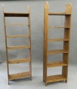 Two pine bookcases. The largest 175 cm high.