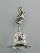 A small silver bell, the handle formed as a stork. 4 cm high.