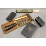 A collection of cutthroat razors, etc.