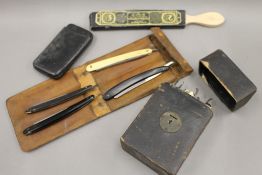 A collection of cutthroat razors, etc.