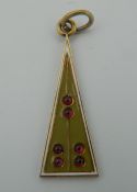 A Russian green enamel and garnet pendant. 4.5 cm high.