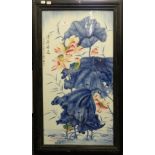 A Chinese porcelain plaque with floral decoration and calligraphy, framed.