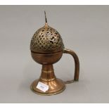 An early Ottoman Tombac incense burner. 23.5 cm high.