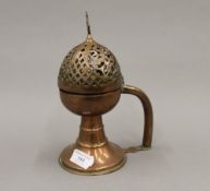 An early Ottoman Tombac incense burner. 23.5 cm high.