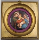 After MURILLO, a hand painted circular porcelain plaque depicting the Madonna and Jesus,