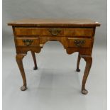 A 19th century walnut lowboy. 75.5 cm wide.