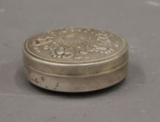 A Chinese circular box. 8 cm diameter.