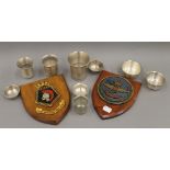 Two military plaques and a quantity Arabic toasting cups. The plaques 18 cm high.