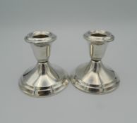 A small pair of Gorham sterling silver candlesticks. 8 cm high (15.6 troy ounces weighted).
