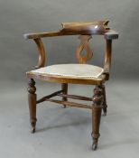 A Victorian mahogany desk chair. 66 cm wide.