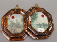 A pair of framed miniature prints. 24.5 cm high overall.