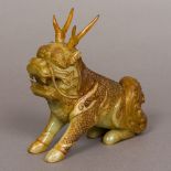 A Chinese jade carving of a Qilin, typically modelled. 15.5 cm high.