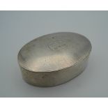 An oval silver snuff box inscribed V. S-S 13.4.52. 6.5 cm wide (45 grammes).