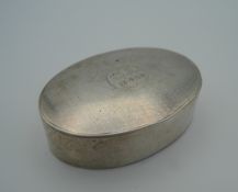 An oval silver snuff box inscribed V. S-S 13.4.52. 6.5 cm wide (45 grammes).