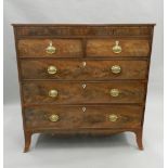 A 19th century cross banded mahogany chest of drawers. 114 cm wide.