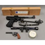 An air pistol, gun cleaning kit, etc.