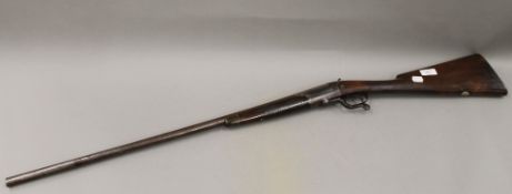 A percussion cap shotgun - WITHDRAWN Barrel engraved ''E.M Reilly & Co, 277 Oxford St London''.