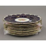 A set of ten Royal Worcester cabinet plates, finely gilded on a cobalt blue ground,