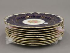 A set of ten Royal Worcester cabinet plates, finely gilded on a cobalt blue ground,