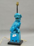 A Chinese pottery Dog of Fo lamp. 32 cm high.