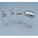 Two silver and cut glass screw top scent flasks,