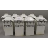 A set of white porcelain storage jars. 21 cm high.