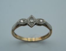 A 9 ct gold and diamond ring. Ring Size S (2.