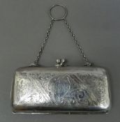 A silver purse. 11.75 cm wide, 6.5 cm high (76.