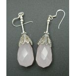 A pair of silver and rose quartz earrings. 5 cm high.
