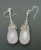 A pair of silver and rose quartz earrings. 5 cm high.