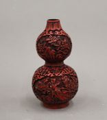 A small Chinese double gourd vase. 14.5 cm high.