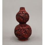 A small Chinese double gourd vase. 14.5 cm high.