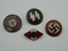 Four Nazi type badges