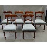 A set of six Victorian mahogany dining chairs. 45 cm wide.