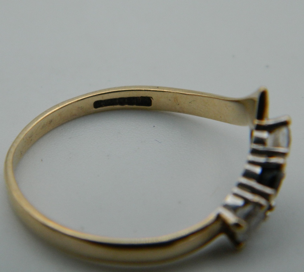 A 9 ct gold diamond and sapphire wishbone ring. Ring size M (1. - Image 3 of 3