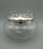 A Gorham and Co vintage sterling silver topped cut glass powder bowl and cover. 11 cm diameter.