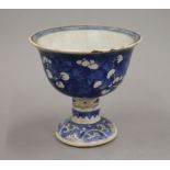 A Chinese Kangxi blue and white porcelain stem cup. 11.5 cm high.